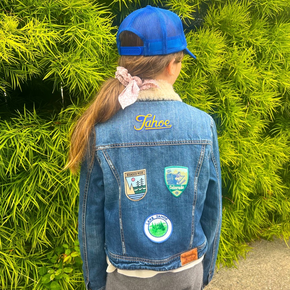 Vintage teddy lined Abercrombie & Finch denim jacket. Ski patches.